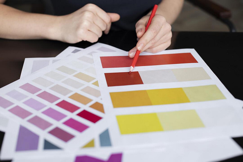 A person chooses the colors